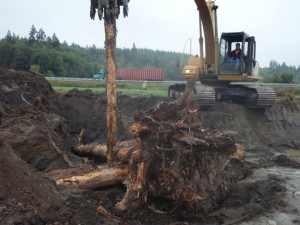 Pounding in pilings during log jam installation